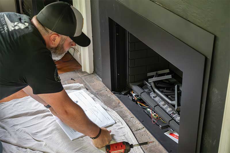 Dj Cross Technician Checking Gas Fireplace